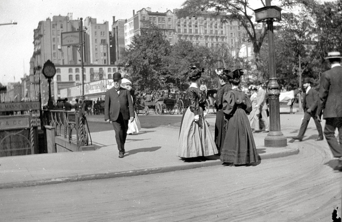New York circa 1910. Fifth Avenue at 25th Street looking north. From a collection of found nitrate negatives.  The corner signpost shows Fifth Avenue and 25th street if you zoom in. The store on the left is Caswell Massey and Co., which had a 202 Fifth Avenue branch. I'm guessing the date because many of the photos in the collection are views of the Metropolitan Life tower and vicinity - 23rd Sreet Madison Square.  The tower was the tallest building in the world from 1909 to 1913 and might have attracted the attention of a photographer when it was new.  The dress and vehicles in the photo put it before 1920, I think. View full size.