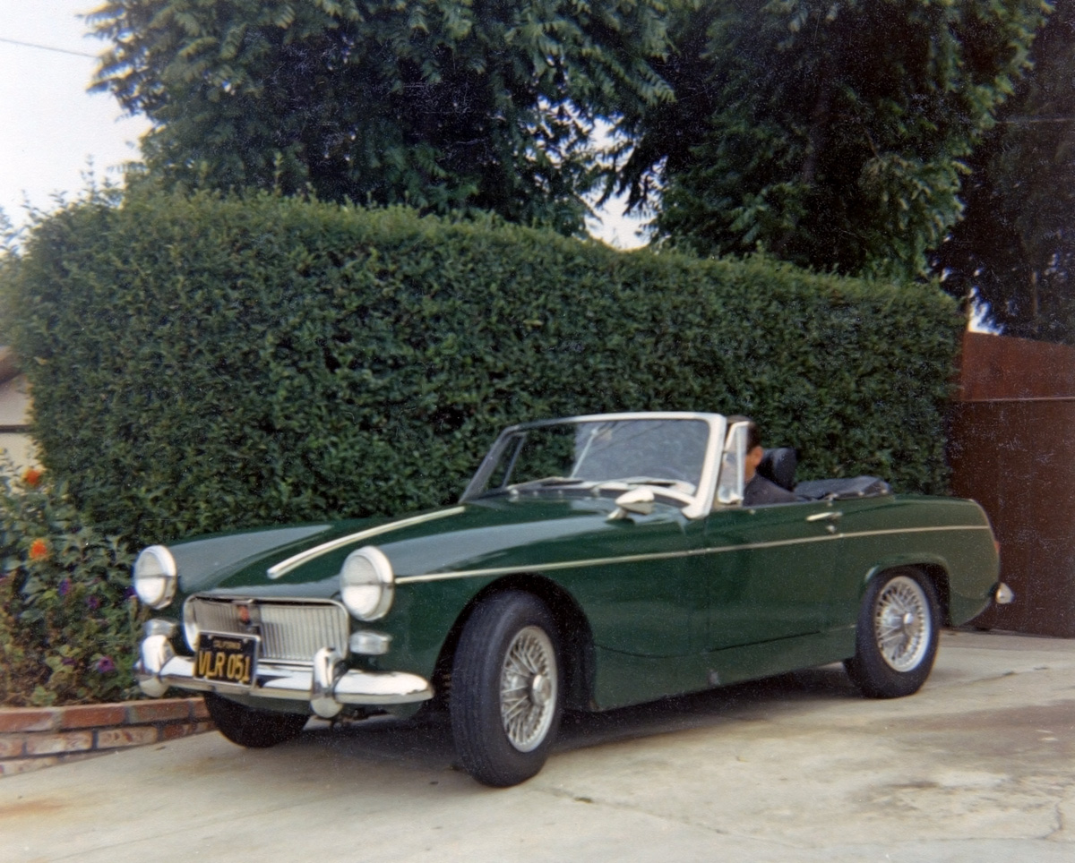 Dad's second British sports car, after his '52 MG-TD, was this new 1966 MG Midget. After selling the TD in 1956 he bought a new '56 VW, then a used '52 Chevy, then a new '62 Ford Falcon which was traded in for the Midget. Dad really wanted an Austin Healey 3000 so he traded the Midget in for a '67 3000 in early 1968. East Richmond Heights, San Francisco Bay Area, 1966. View full size.