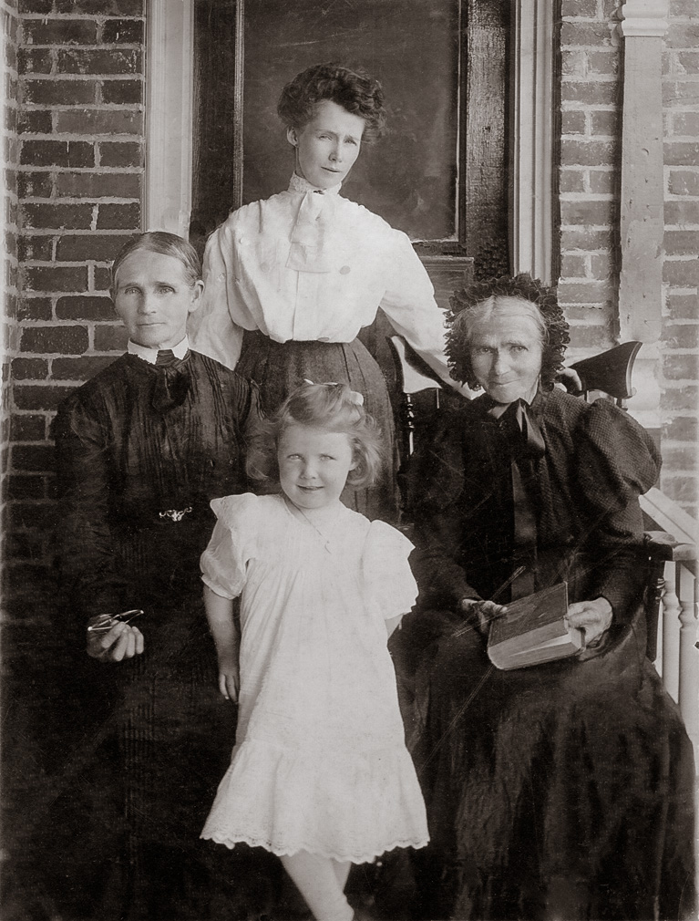 Emmett, Michigan 1903. My decendants, clockwise from top: Cecilia Cogley Donahue, aged 33 (b. 12/15/1870, d. 9/30/1963);  Cecilia's grandmother, Bridget Fogarty, aged 82 (b. 1821, d. 3/27/11); My paternal grandmother, Mary Alma Donahue Breen, aged 5 (b. 11/28/98, d. 11/10/82); and Cecilia's mother, Katherine Brennan, aged 56 (b. 1847, d. 1938).  
Cecilia married Michael Donahue, a dentist, who graduated from Northwestern Dental School in Chicago.
This must have been rare, considering the life expectancy when this photo was taken. My grandmother looks to be about five years old in the photo. View full size.
