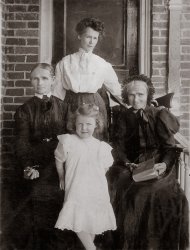 Emmett, Michigan 1903. My decendants, clockwise from top: Cecilia Cogley Donahue, aged 33 (b. 12/15/1870, d. 9/30/1963);  Cecilia's grandmother, Bridget Fogarty, aged 82 (b. 1821, d. 3/27/11); My paternal grandmother, Mary Alma Donahue Breen, aged 5 (b. 11/28/98, d. 11/10/82); and Cecilia's mother, Katherine Brennan, aged 56 (b. 1847, d. 1938).  
Cecilia married Michael Donahue, a dentist, who graduated from Northwestern Dental School in Chicago.
This must have been rare, considering the life expectancy when this photo was taken. My grandmother looks to be about five years old in the photo. View full size.
Old ancestryWow, did others of your ancestors live that long? That is pretty impressive, especially for the women having been born in the 19th century! 
(ShorpyBlog, Member Gallery)