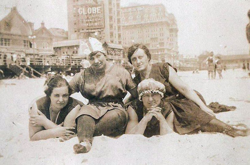 Here is another image from the album I purchased.  I can only imagine how itchy and hot their wool bathing suits were to wear on the sunny beach at Atlantic City.  Note: I "assume" this is Atlantic City.  Does anybody have any information regarding the "Globe" (theatre?) sign in the back ground to substantiate this being Atlantic City?