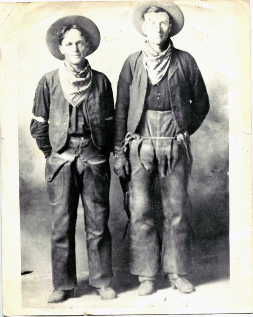 On the right, my grandfather, Albert  W. Perkins, b. 1890, a real working cowboy, taken we think in 1918. His friend to the right is unnamed. Taken in Nebraska. View full size.
