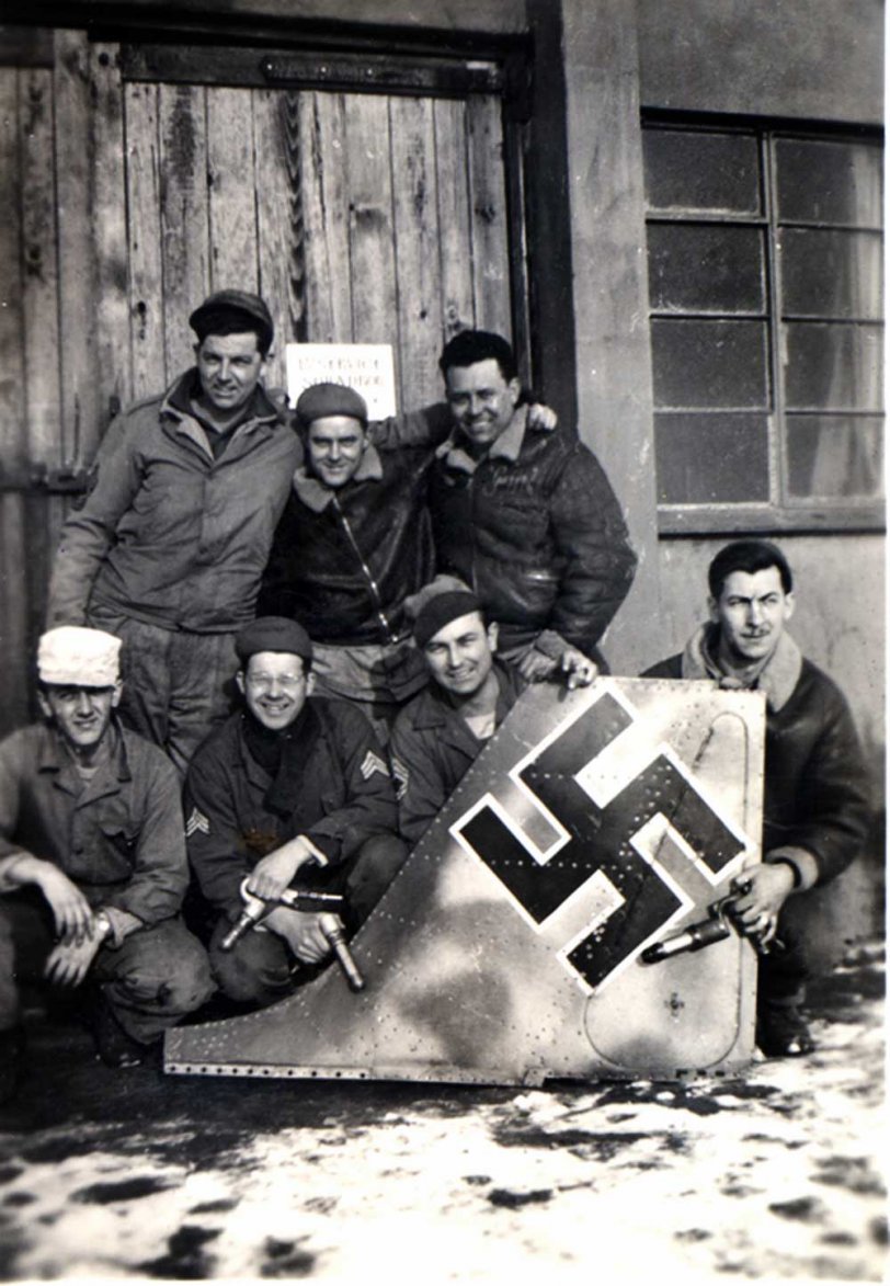 Companion photo to one already posted from an unknown air base in England during WWII. It was apparently taken at the same time. It's hard to miss FW190 tail. Dad had "Snuffy" painted on his jacket. I never heard him mention this nickname. View full size.
