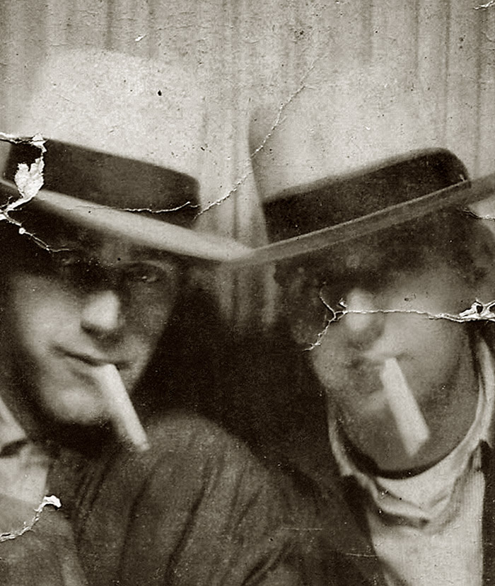 Daddy (right) and his best friend, Bob Haack.  This pic was taken in October 1953 at a photo booth in Woolworth's in  Milwaukee. My dad was 16 and joining the Army soon.  I love how the double exposure makes it look like they both have two cigs in their mouth - double the pleasure!  View full size.