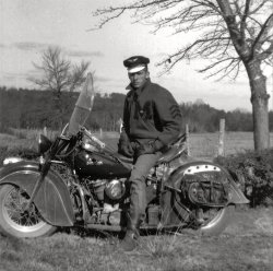 My dad had this awesome Indian motorcycle while he was in high school. He admits it made him popular with the ladies at Maury High in Dandridge, Tennessee. He does, of course, wish he still had it. I do, too! View full size.
Just sayin&#039;Tom of Finland would've LOVED this.
Gearhead HeadgearI bet the aviator's cap didn't hurt either.
Nice bike!That's a nice Indian and your dad must have been popular with the ladies.  It's nice to see a picture close to home since Dandridge isn't too far from where I live now.
Wow!Hubba Hubba Hubba! It was the whole package that the ladies fell in love with. He should have been in movies!
i no im such a grl but...omg he's so hott
they dont make guys like that nemore
Kenneth Anger Eat Your Heart Out