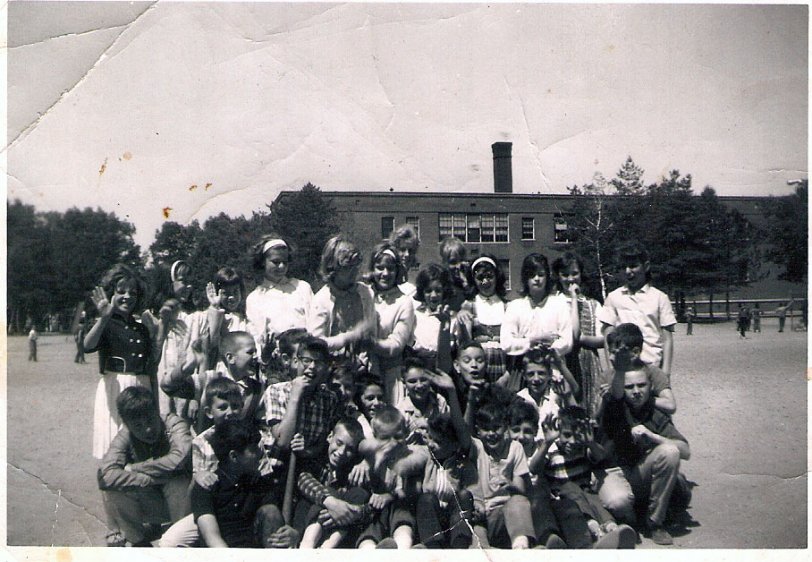 This was taken in June of 1964 behind Thomas M. Balliet Elementary School in Springfield Massachusetts. The students were in Mr. Johnson's sixth grade class in Room 12. The happy looking kid in the second row is my late brother, David Vennell. He's the one on the left side of the photo looking towards his left. View full size.

