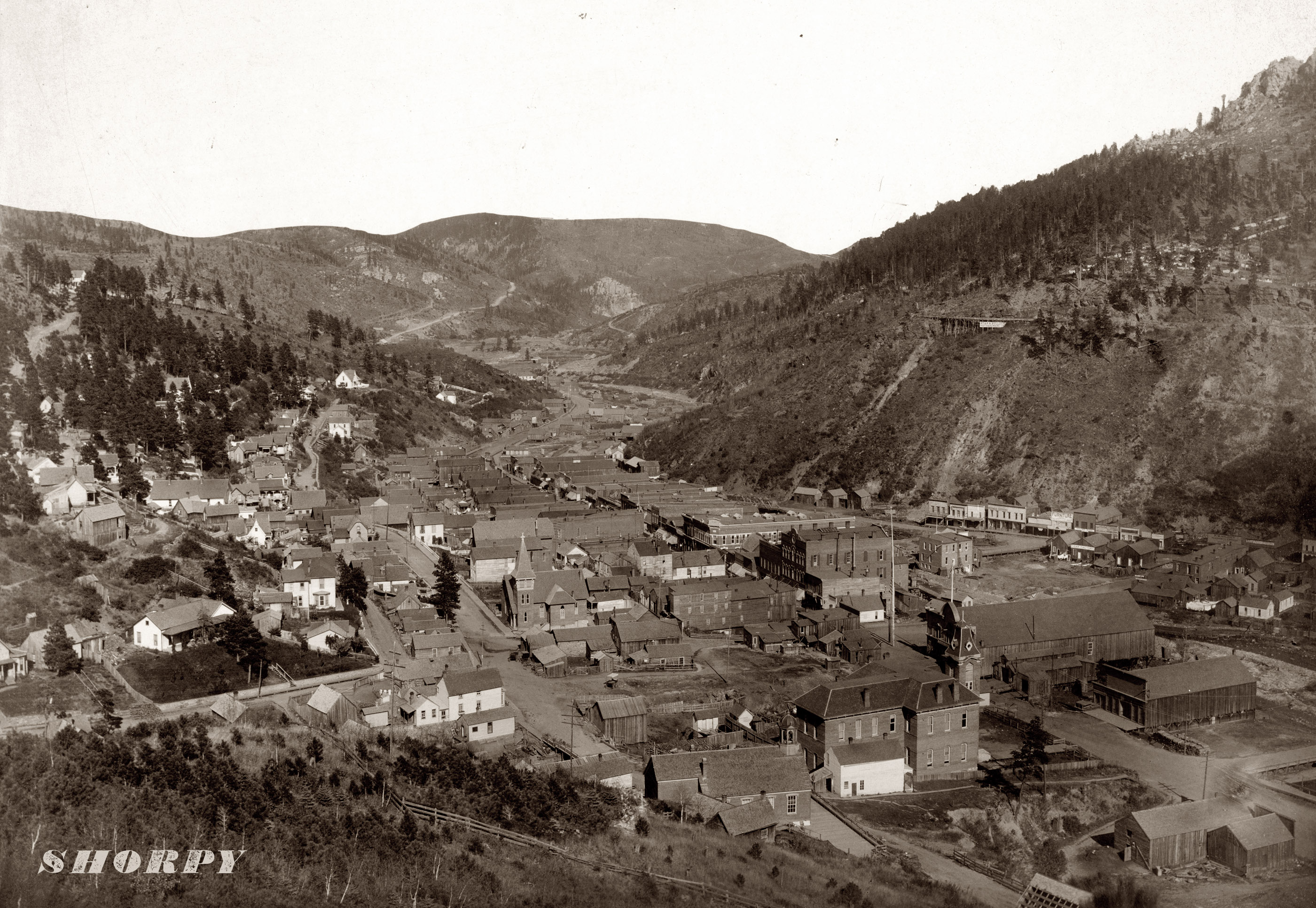 Deadwood, South Dakota, from Mrs. Livingston's Hill. View full size or zoom in. Circa 1888 photograph by John C.H. Grabill. Another Deadwood shot here.