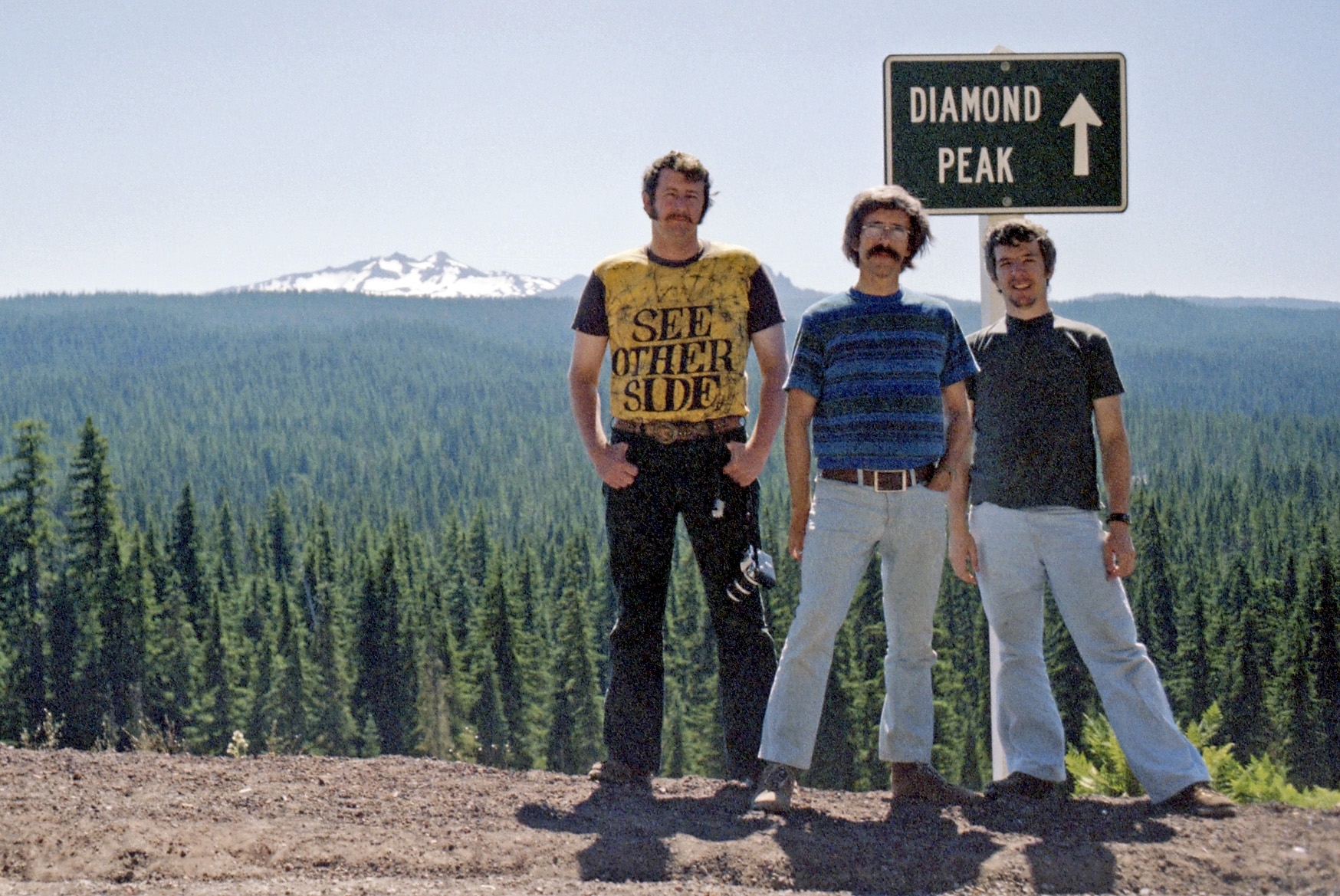 A companion to my Crater Lake photo, same trip, same guys: my friend, my brother, me. In Oregon, near some big mountain or other. Trying to remember the name... don't tell me, it'll come to me... View full size.