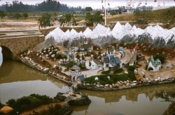1950s or early 1960s Disneyland, from a ancient suitcase found next to a freeway on ramp. View full size.
VacantLandThis is Pinocchio's Village in Storybook Land taken from the Casey Jr. Circus Train. In the background, part of the large section of the park that was still undeveloped and vacant when it opened in 1955. Parts of Autopia and the Monorail now occupy the space, along with It's a Small World.
Under constructionLooks like D-land under construction. It is hard to remember what Anaheim looked like before Disney hit the scene. What a wonderful find!
(ShorpyBlog, Member Gallery)