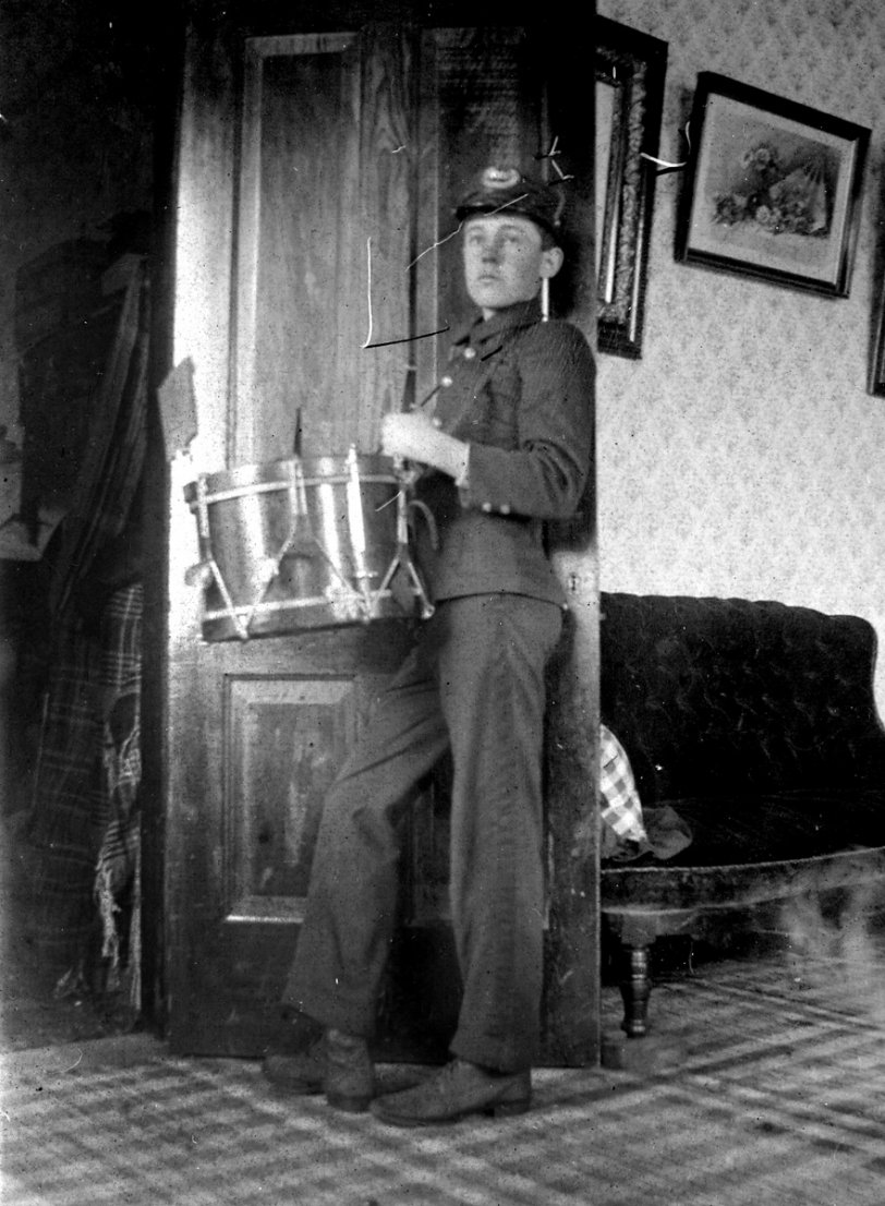 Drummer in the high school marching band. Iowa, 1903.
