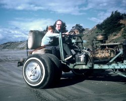 On the beach, near Montery Bay, California, c. 1965. View full size.
Flatties RuleNice Ford Flathead V8, -- more power to the people. The vehicle is from the pre Meyers Manx era of dune buggies such as one featured in the immortal ultra cheap movie Kreegah the cave man starring Arch Hall Jr. 
(ShorpyBlog, Member Gallery, Cars, Trucks, Buses)