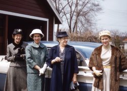 This was taken in 1958 in Windsor (then Riverside) Ontario. From left to right: my mother, Betty; Aunt Katherine; my father's mother; and Aunt Molly. One mile behind the trees is the City of Detroit. Everyone is ready for the Easter service at the Riverside United Church. My grandmother and the two Aunts were visiting from Toronto, and there was always a traditional shopping spree to Hudson's famous department store in Detroit. This Kodachrome was taken by my father, John McIntyre, with his Leica camera. He worked at Ford and I think the car is a Monarch. My father and Aunt Katherine still live in Toronto. View full size.
The Car1957 Monarch Richelieu Phaeton sedan. Quite rare. Outta the way, ladies!
Hats, furs, MercWow! And a perfect car for those gals. Thanks!
(ShorpyBlog, Member Gallery)
