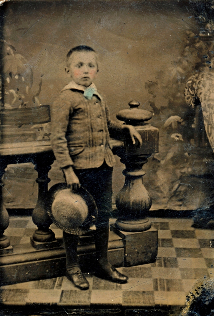 My grandfather Emile Petitclerc, 8 year old in 1892. Tintype photo taken at a Quebec City fair. Some colors added by the photographer.
