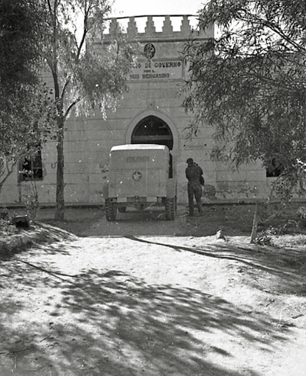 I recently acquired some negatives and had these ones developed. They are not in the greatest of shape but seem very interesting. They all seem to be from WW2. Not sure of the actual location or what the building is.

[This is in Libya. -tterrace]