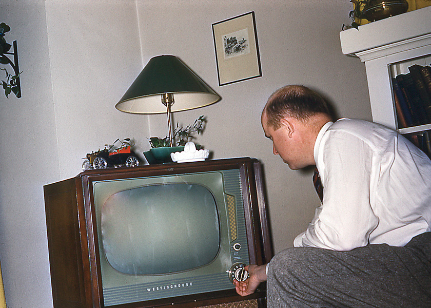 Dad is waiting for the Westinghouse to warm up, and the channel selector is set at 7, WXYZ, Detroit. Other choices were 2, WJBK; 4, WWJ and 9, CKLW in Windsor, Ontario, where we lived. The console TV had doors that closed so that it looked like a piece of fine furniture. The TV was turned on for a show, and when that was over it was turned off. If you tuned in too early in the day all you got was the dreaded Test Pattern. A favourite back then was Detroit's own Soupy Sales. The antenna was up in the attic of our two-story home. View full size.