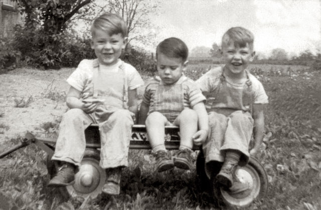 My brothers Kenny, Tommy and Larry Hedge in the Radio Flyer. Taken in Hall, New York, mid 1950's.   