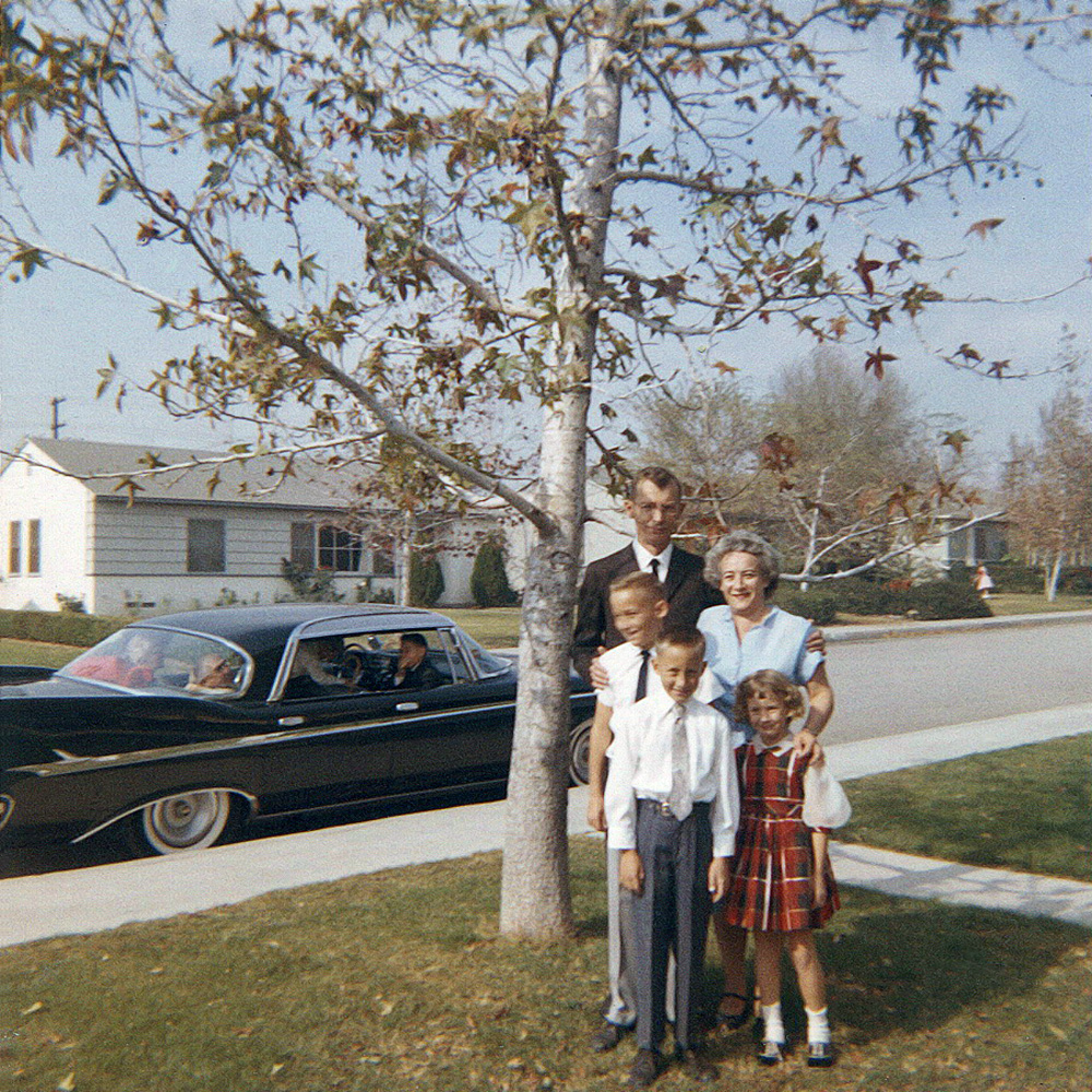 A family pic in the front yard with our cousins and grandparents in the black Imperial. Early 60's. View full size.