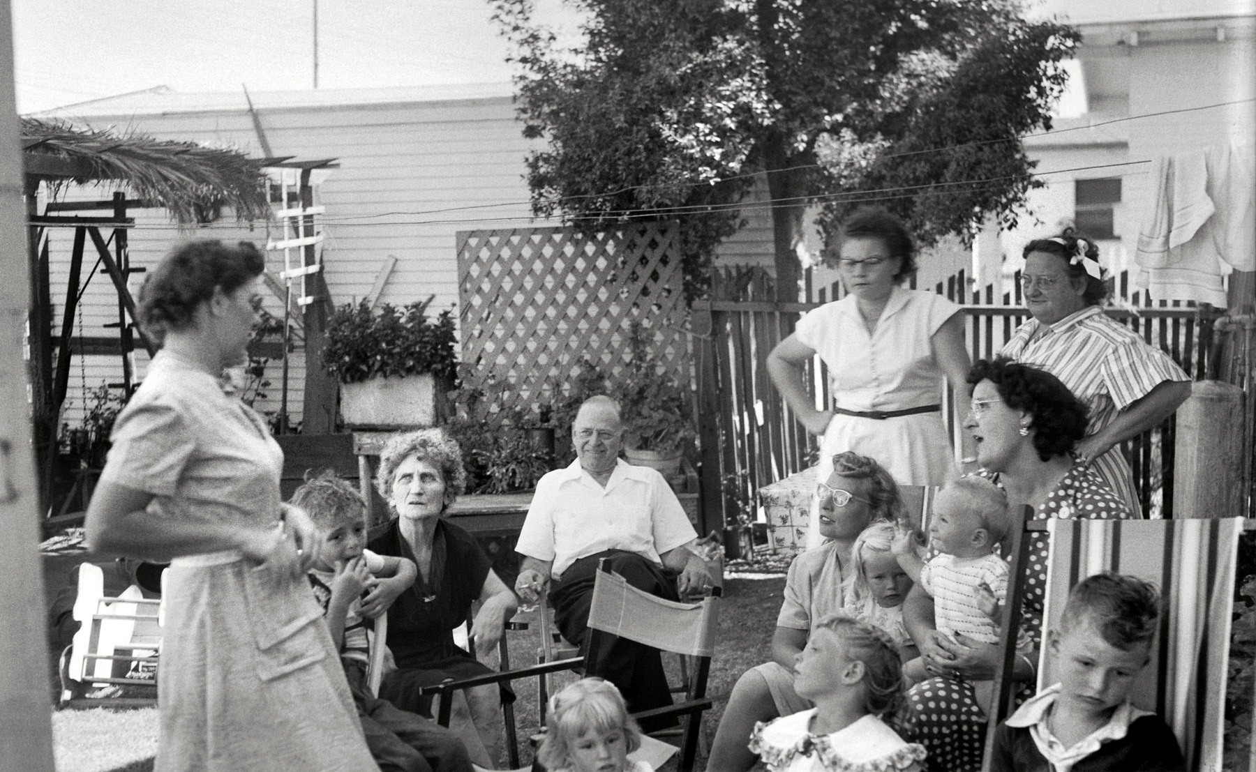 I don't know who all the people are, but the woman third from the left is grandmother Carrie Fox and the woman farthest to the right I only know as "Babe" (who, if I remember right, was the maid). If I had to hazard a guess, I'd say this is the early fifties. View full size.