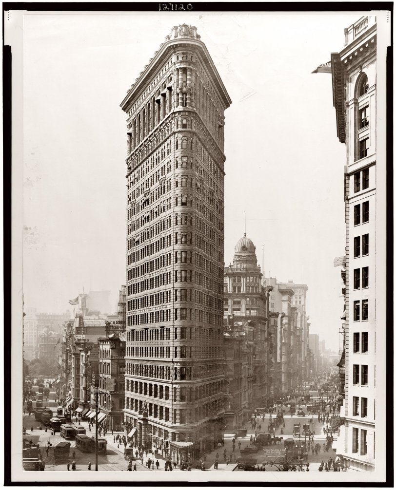 1910 Irving Underhill photo of the 22-story Flatiron (Fuller) Building at 175 Fifth Avenue, one of the earliest (1902) buildings in New York to attain such heights. View full size. More here.