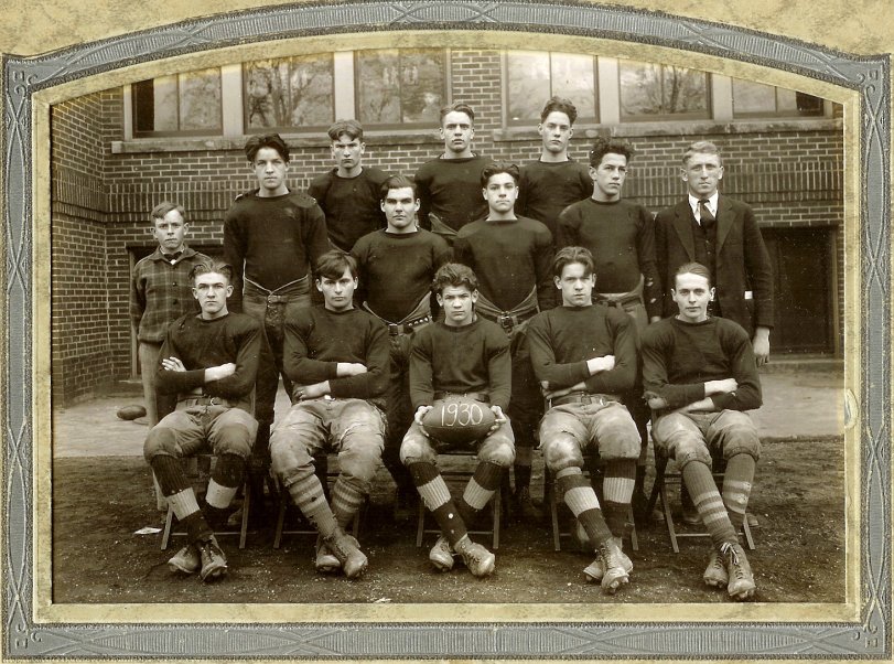 A friend found this at a thrift shop. On the back someone wrote "Harry's football team, High School, Rootstown, Ohio." I can't help but notice the size of the football and lack of helmets. I wonder if this was before helmets. View full size.
