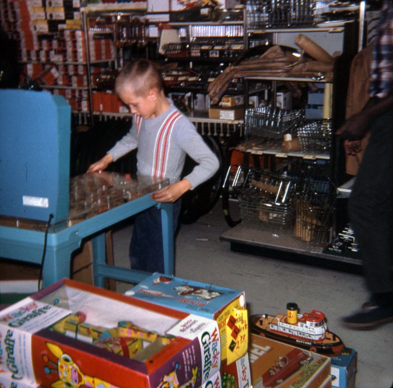 Here I am testing a ware in a hardware store. Brunswick, Georgia, 1966. Zoom in.
