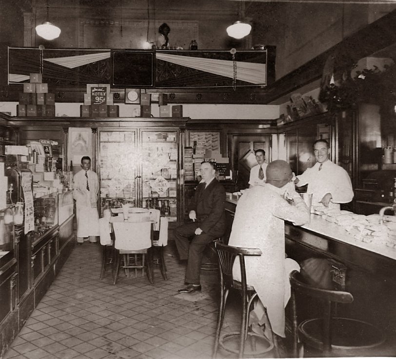 This is a picture of my father, Fred T. Massie. It was taken when he was about 18 in around 1928. Although still in high school, he was already managing this drugstore in Norfolk, Virginia. Daddy is the handsome young man in the foreground wearing the "Hollywood" smile. View full size.
