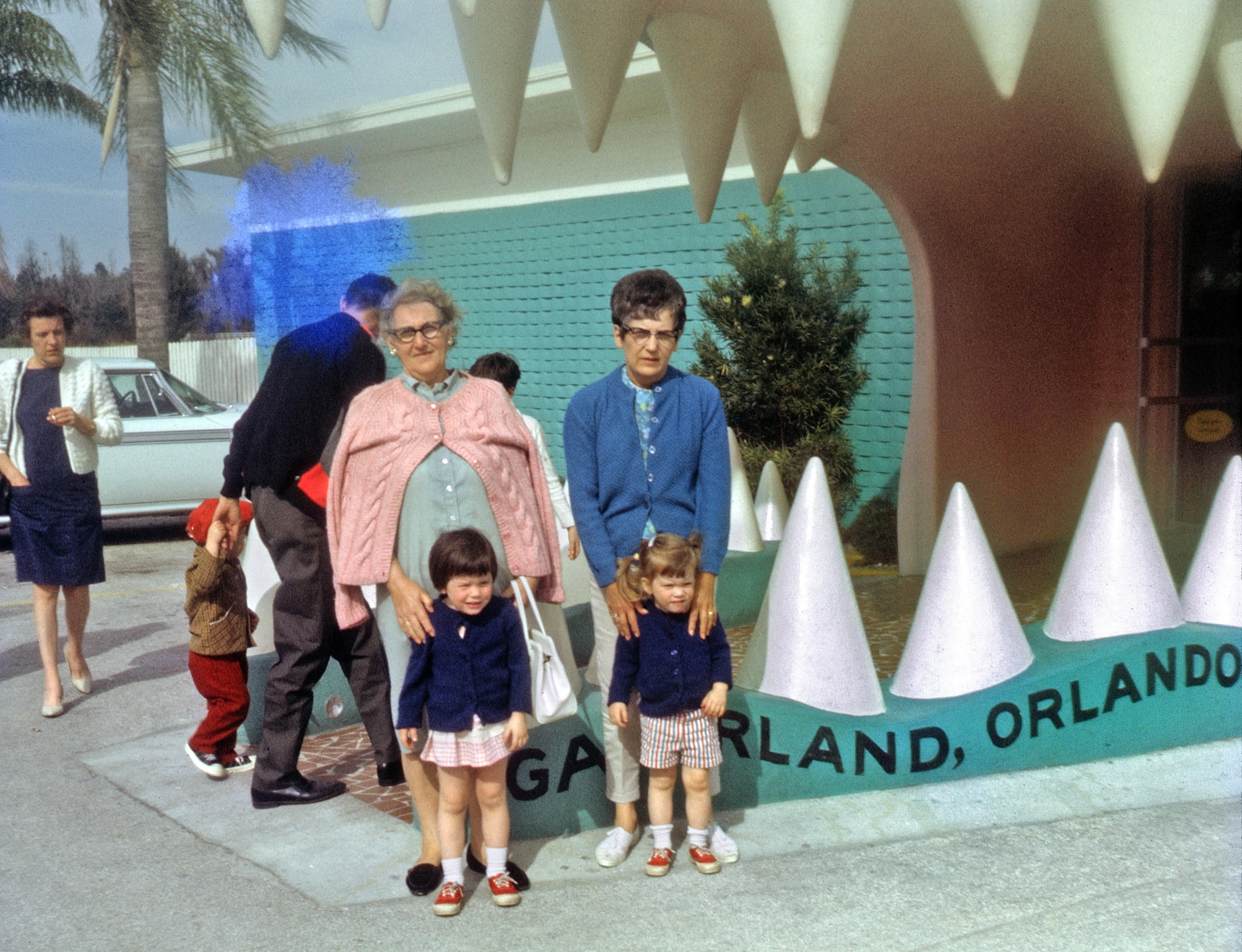 Another shot from the collection of family photos I've been scanning for a friend - she's the little girl on the right, with her sister, grandmother and aunt. Orlando, Florida's Gatorland still exists, as does this toothy entrance. The blue cloud is the result of mold eating its way down to the blue layer of the emulsion of this unbranded color slide, processed in February 1968. View full size.