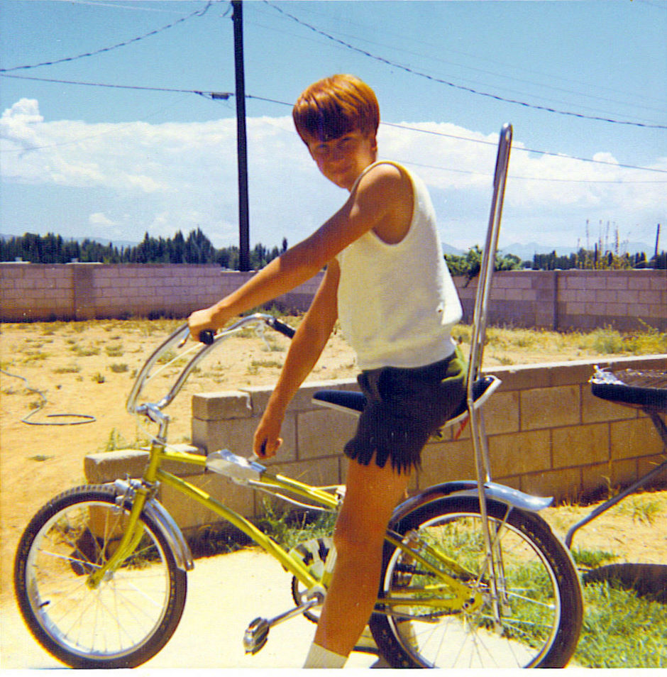 My brother's cool bike with banana seat, sissy bar, hand brakes and either a 3 or 5 speed transmission. Sometime in 1969.
