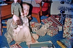Diamond Bar, California, Christmas Day 1964. My nephew Jimmy got a G.I. Joe. I got almost all of him in the frame. Not Kodachrome, unfortunately, but some cheap department store off-brand slide film. View full size.
