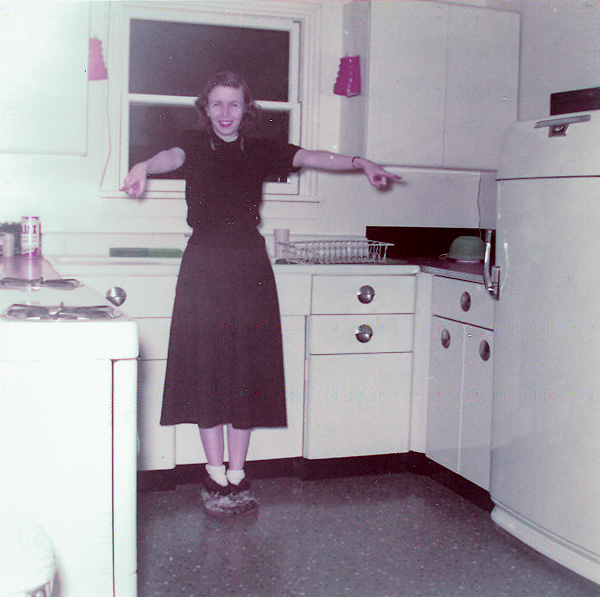 January 26, 1957. My Grandparents finally made it to Alaska. Grandma loves the kitchen! View full size.