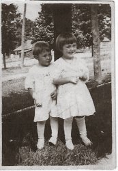 This is a picture of Mary Ida Wood and Theron Michael Wood.
Mary Ida was born June 15, 1915, and Theron Michael was born
August 19, 1916. They are from Bangor, Michigan. View full size.
(ShorpyBlog, Member Gallery)