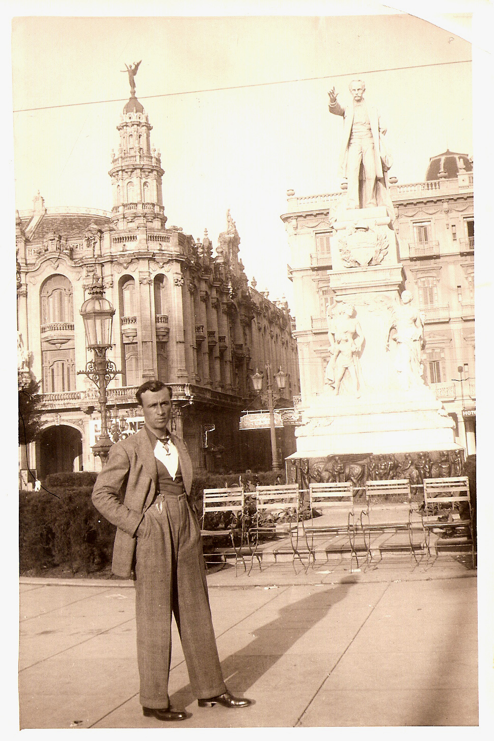 A photo of my grandfather, Giacomo Arena, taken sometime in the 1930's in old Havana's Parque Central, in front of the Marti statue outside the Hotel Inglaterra. The building to the left is El Gran Teatro de la Habana. View full size.