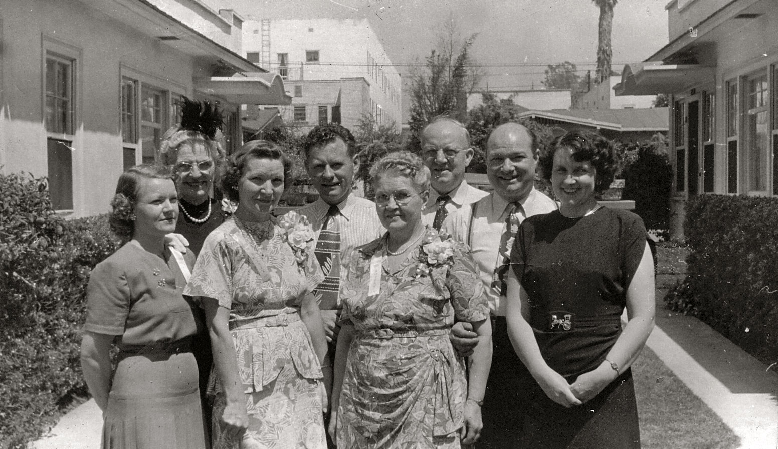 From the same spot with the group of kids, now the adults. Included in the cast are my grandparents, one of my great aunts, a great uncle, my great-grandparents, and a couple others I don't recognize. Taken around 1946. View full size.