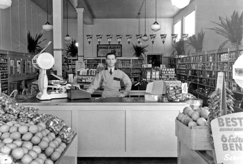 No need to call, here you can plainly see that my father has Prince Albert in a can at his store, the De Luxe Groceteria in San Francisco. This is 1934, shortly after he opened for business. View full size.