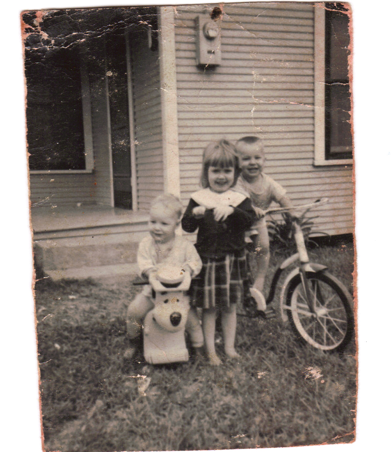 Approximately 1960 in Baytown, Texas. My sister Althea Racca and our brothers Faron Racca (bike) and James Racca (Huckleberry Hound).