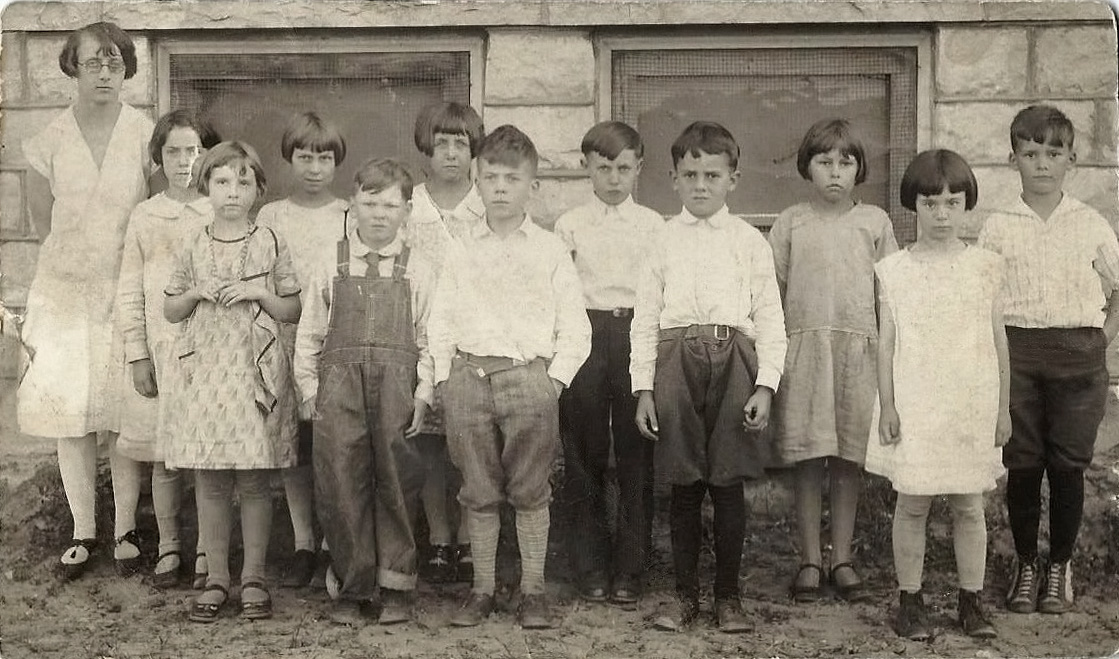 Third grade. Hancock, Wisconsin. My dad is fourth from the right. Unlike so many other class photos popping up on Shorpy lately, none of these tykes appear to enjoy having their picture taken.


(And -- Thank you Shorpy, for taking the nasty creases out of the image. Amazing!!


  View full size.