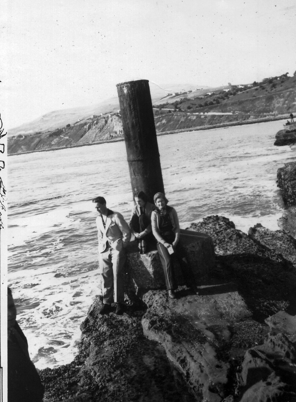 Well dressed and hanging out at the ocean, possibly around Malibu, 1930's. From my grandmother's collection. View full size.