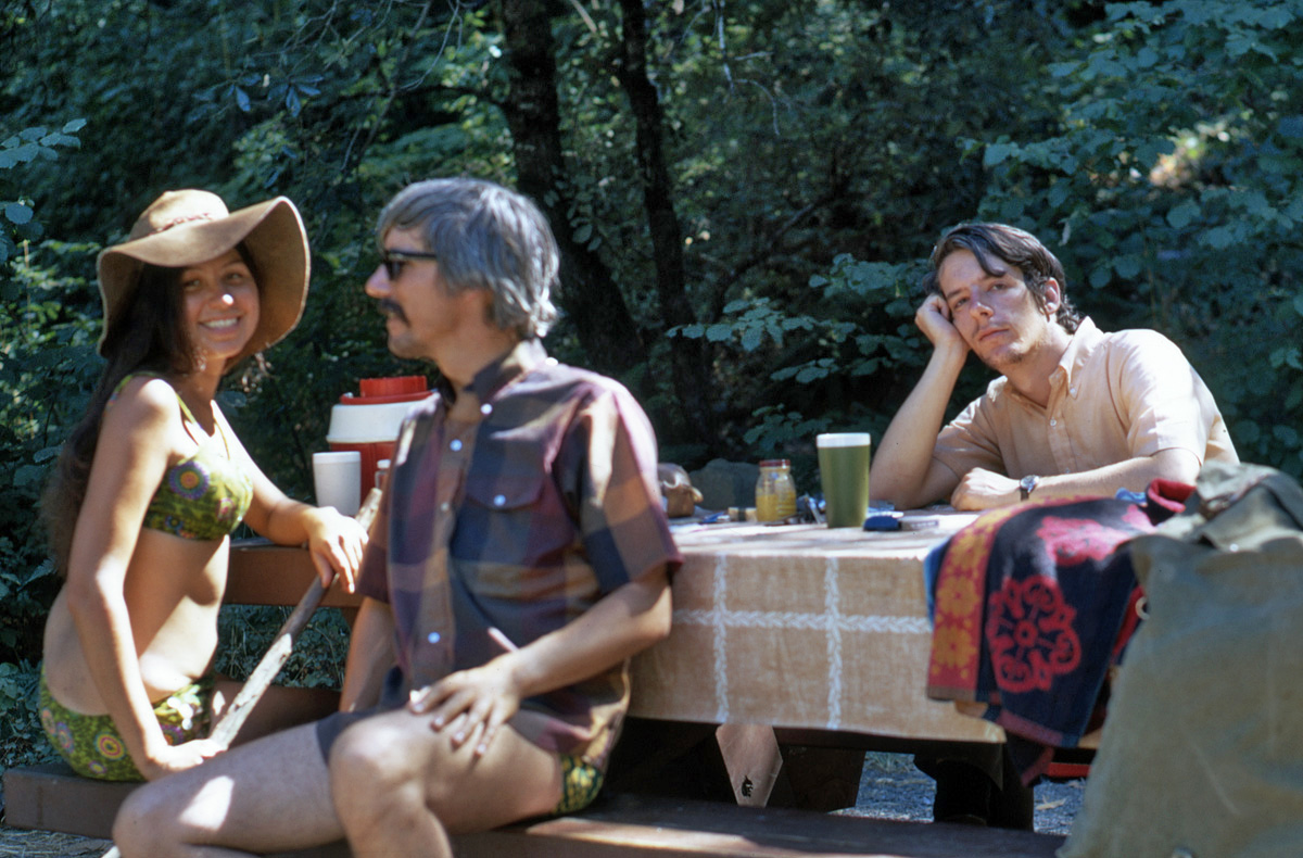 August 1971 On vacation again, this time camping with my brother and sister-in-law at Hoopa, California. I'm not sure if my expression reflects my real mood, or if I'm just being a wise guy. Note how I set up this self-timer Kodachrome so that I was the one in focus. View full size.
