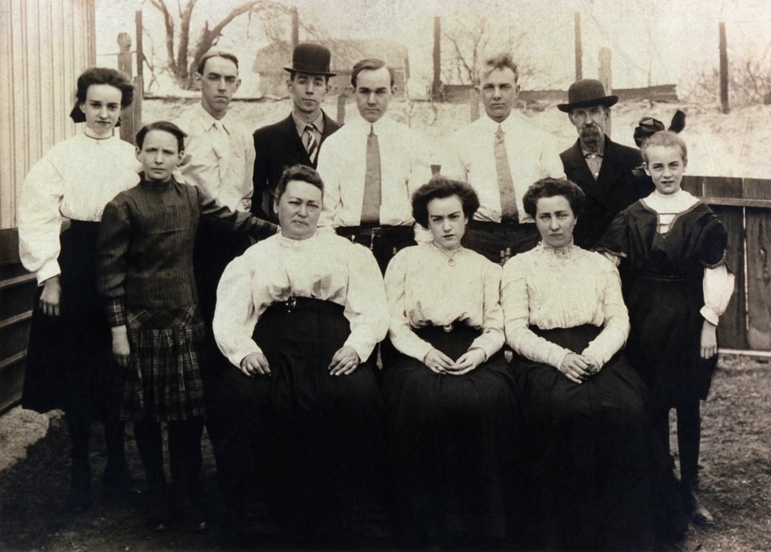 The Harrington family in St. Louis, MO, 1910. Patrick (man at far right) came to America from Ireland in 1858, and fought in the Civil War in the Irish Brigade of Boston. Catherine Carney (third woman from left) was sent to America alone as a child during Ireland’s Great Famine. She and Patrick had eight kids, including my grandfather Charlie (left of Patrick) and (third man from right) Eddie, WWI veteran and father to famous American socialist Michael Harrington. View full size.
