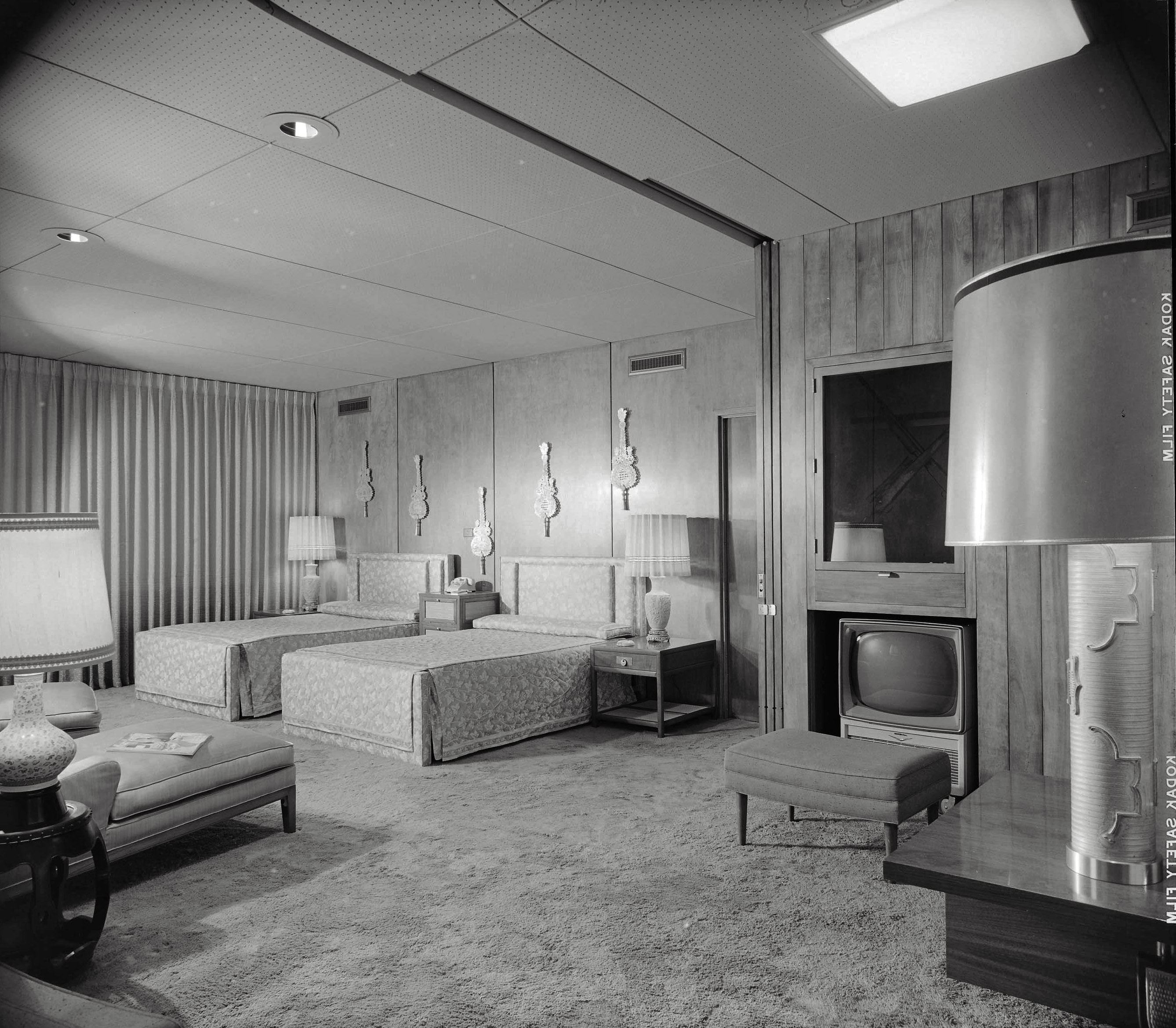 1956. "Hayes residence, Kessler Lake Drive, Dallas. Master bedroom. Architects: Prinz & Brooks." Our first  look at the seven-bathroom, 7,300-square-foot bungalow built by Texas car dealer Earl Hayes. 8x10 acetate negative by Maynard L. Parker for House Beautiful. Source: Huntington Library. View full size.
