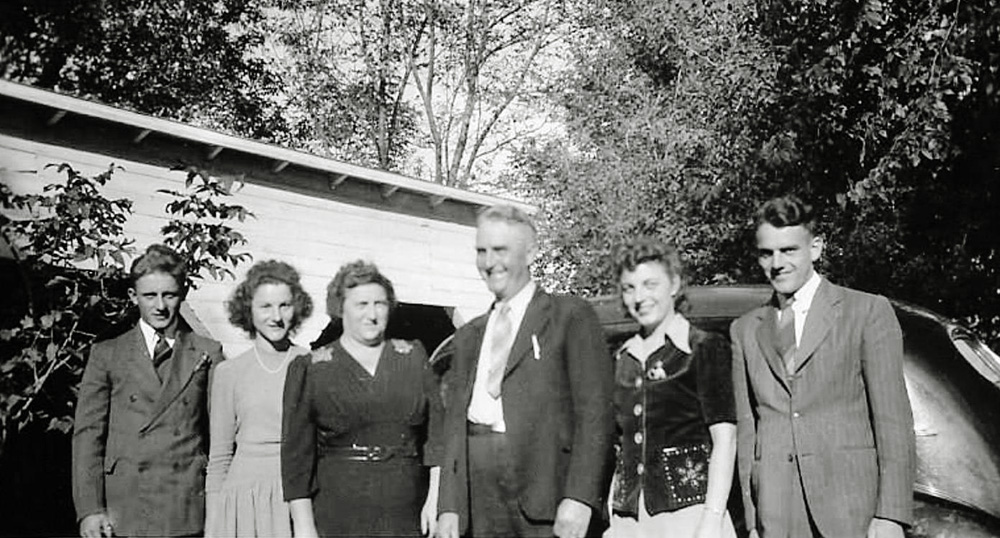 The Herman Bohn family, early WWII. From left: my uncle Bernold, aunt Verona, grandma Anna, grandpa Herman, aunt Sylvia, and my father, Gerhardt. Taken just before my dad went into the army. He kept a copy of this photo in his wallet for the duration of the war. View full size.