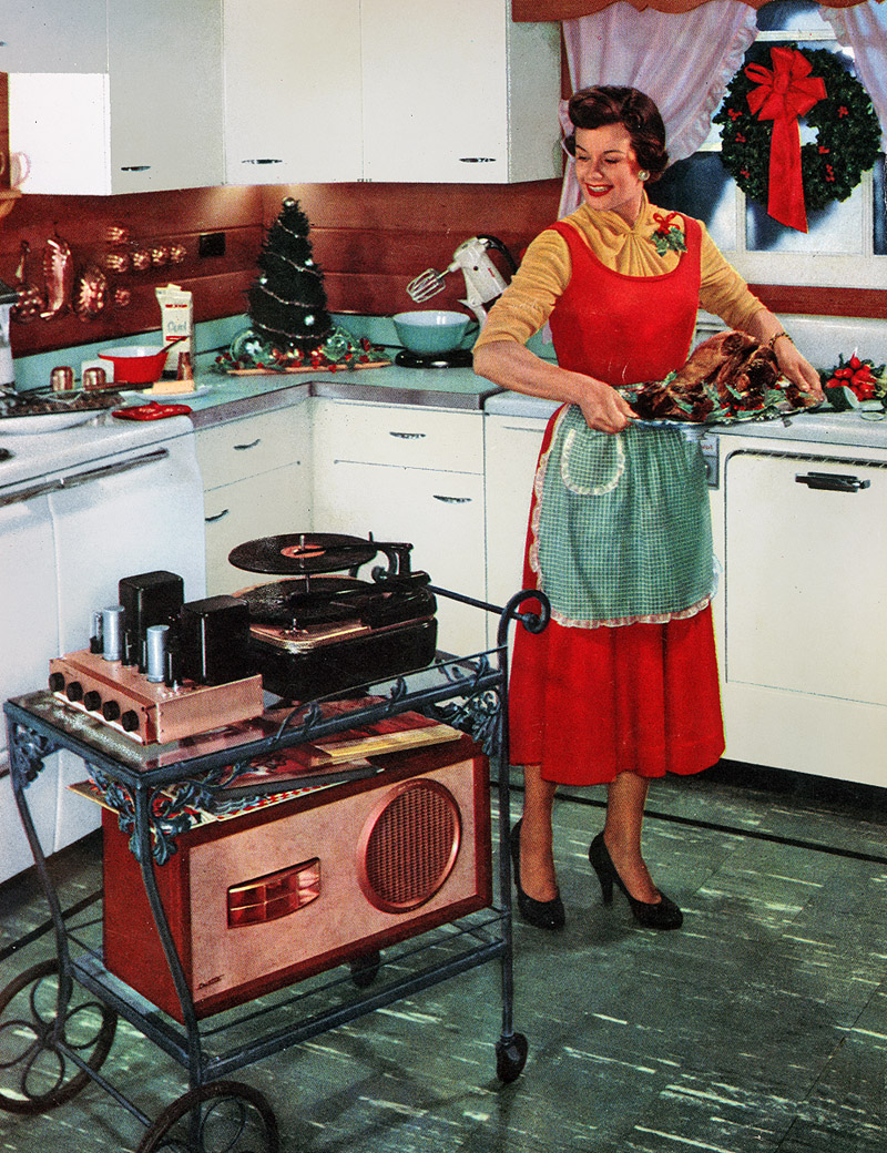 December 1954. "A novel idea for the audiophile who likes his music wherever he is. A household teacart can be used as a mobile carrier for any combination of audio gear." View full size. Ektachrome by Ken Schmid Studio. Components: Regency HF-150 high fidelity amplifier, Webcor "Diskchanger,"  Jensen "Duette" reproducer.  More from the original press release from Regency Inc.: "Most homemakers are used to wheeling their cleaning equipment with them from room to room -- why not do the same for the entertainment unit that helps to lighten her tasks as much as her vacuum cleaner or her floor waxer? Pictured are the essential ingredients for a simple portable hi-fi system that can be moved from room to room with ease. The idea is of interest to the audio dealer as an unusual and salable merchandising gimmick and to the audiophile as a convenient method of mounting standard components to provide portability to his hi-fi system. Before our eagle-eyed reader-technicians swamp us with letters pointing out the missing interconnections, may we say that Mrs. Audiophile has just been surprised with this exciting Christmas present from Hubby and he refuses to hook it up until he gets outside of his turkey dinner."
