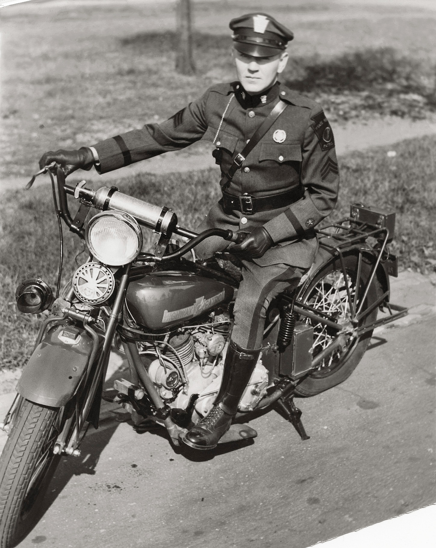 My grandfather,  H. K. Gemmill, member of the Pennsylvania State Highway Patrol, which later became the PA State Police. On an Indian Motorcycle, taken in 1932. View full size.