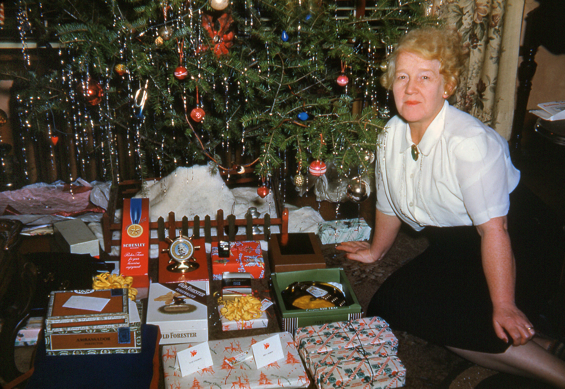 Christmas 1949 in Valparaiso, Indiana.  That's Grandma in a Kodachrome slide. View full size.