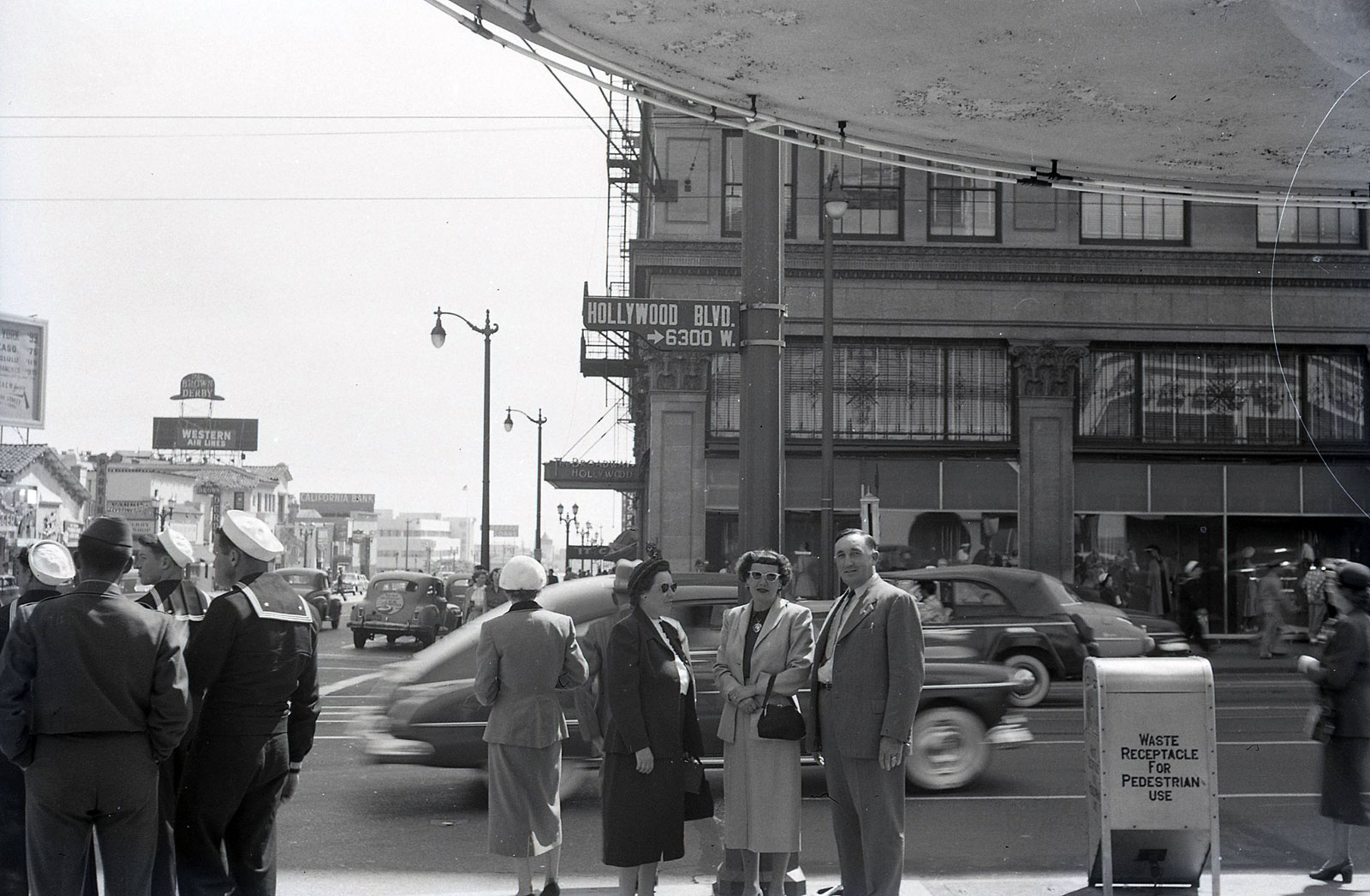This picture was taken in the 50's at the corner on 1645 Vine street. The Broadway building is still there but not for long. View full size.

