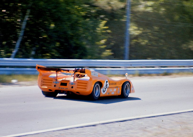 Here's Denny Hulme in the McLaren car 5 at the 1970 Mosport, Ontario CanAm race, held in the aftermath of Bruce McLaren's untimely death. Hulme came in third at the finish. In the coming seasons, Jackie Stewart became a vocal advocate for racetrack safety to stem the carnage among drivers. He was almost vilified for his "crusade" but was vindicated with the results after safety was finally taken seriously. View full size.
