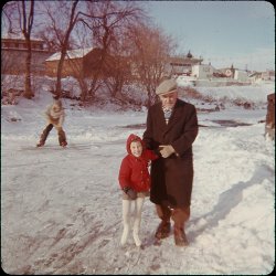 This is on the Kemptville Creek, behind our house on Clothier Street. I am wearing my first pair of real skates and am standing with Mr. Moffatt, our landlord. In the background is the back of the Clothier Hotel.
Nothing has changed in the background over the years. The gas station is now a car repair shop. To the left of us, just out of view is the old brewery which had been vacant for over 70 years when this photo was taken. Rumour has it that a microbrewery is moving in. View full size.
so lovelyI love old family photos, even though, I have so few! Thanks for sharing your pictures.
(ShorpyBlog, Member Gallery)