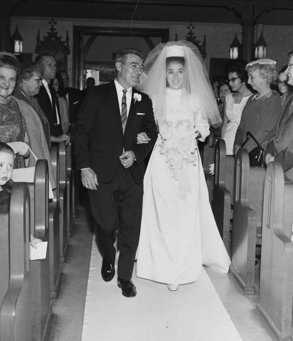 The date is October 13th 1968 and my Grandfather walks his daughter, my mother, down the aisle on her wedding day. View full size.