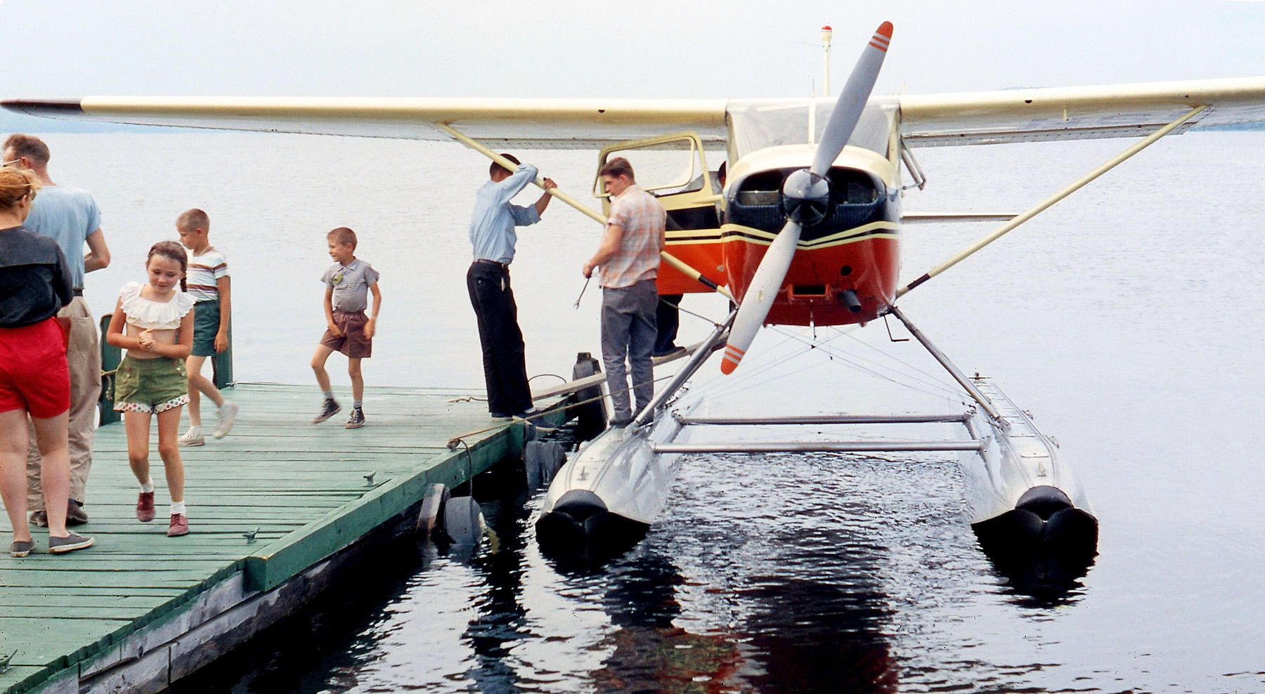 Our 1960 family camping holiday to Maine's Lake Sebago State Park, and Dad sprung for our first plane ride, a 15-minute seaplane tour. He caught us disembarking, me readjusting my shorts ... thanks, Dad! View full size.