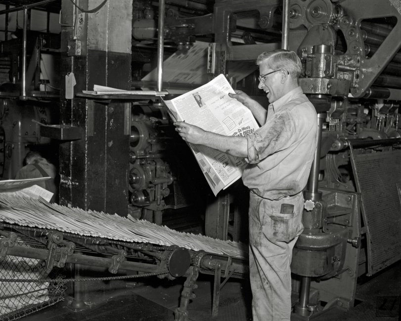 May, 1955. Lafayette, Indiana. The lead pressman at the Journal &amp; Courier beams at the sight of the first ad to roll off of the updated press. View full size.
